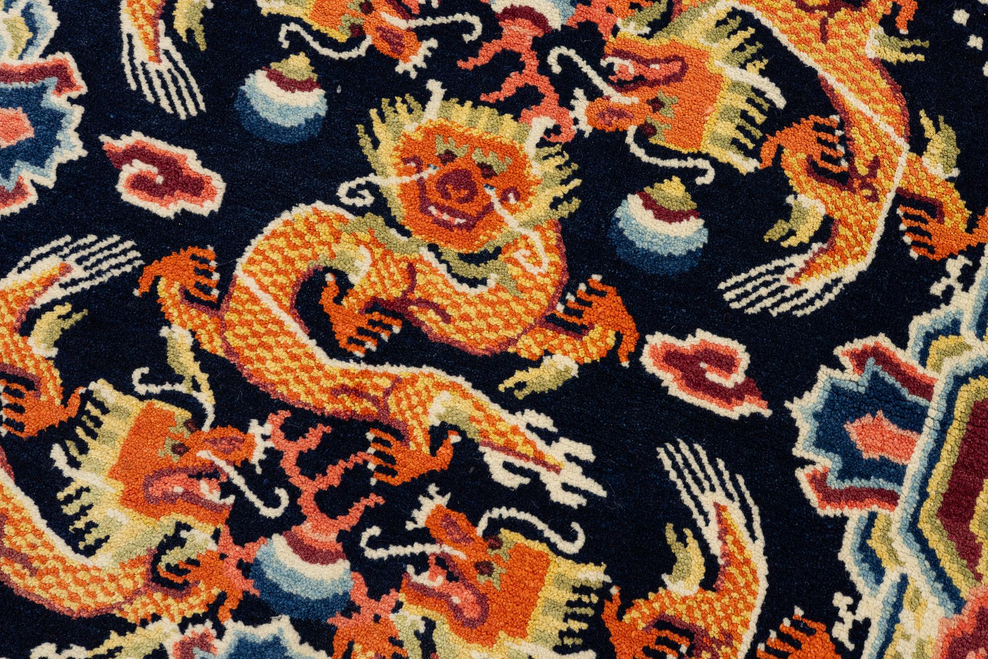 A Chinese small square rug, semi-antique, 65 x 68 cm.