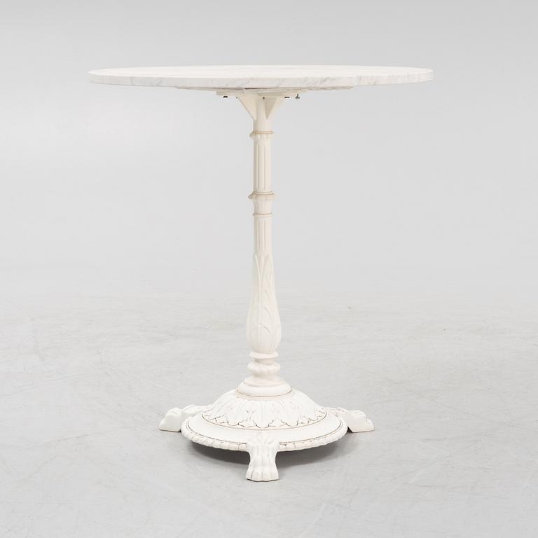 A Byarum garden table later part of the 20th century.