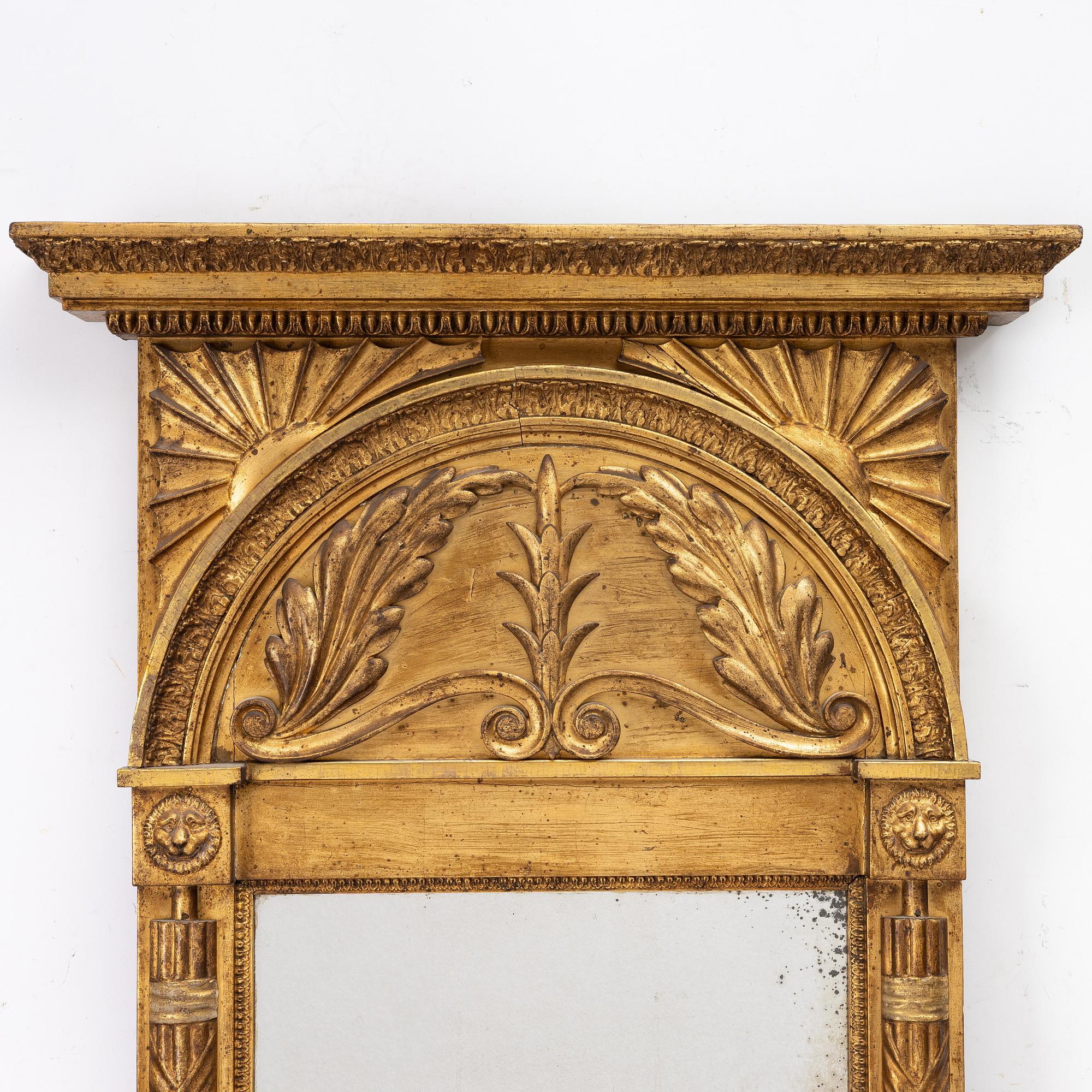 An Empire giltwood mirror by C. G. Hafström (master in Stockholm 1795-1815).