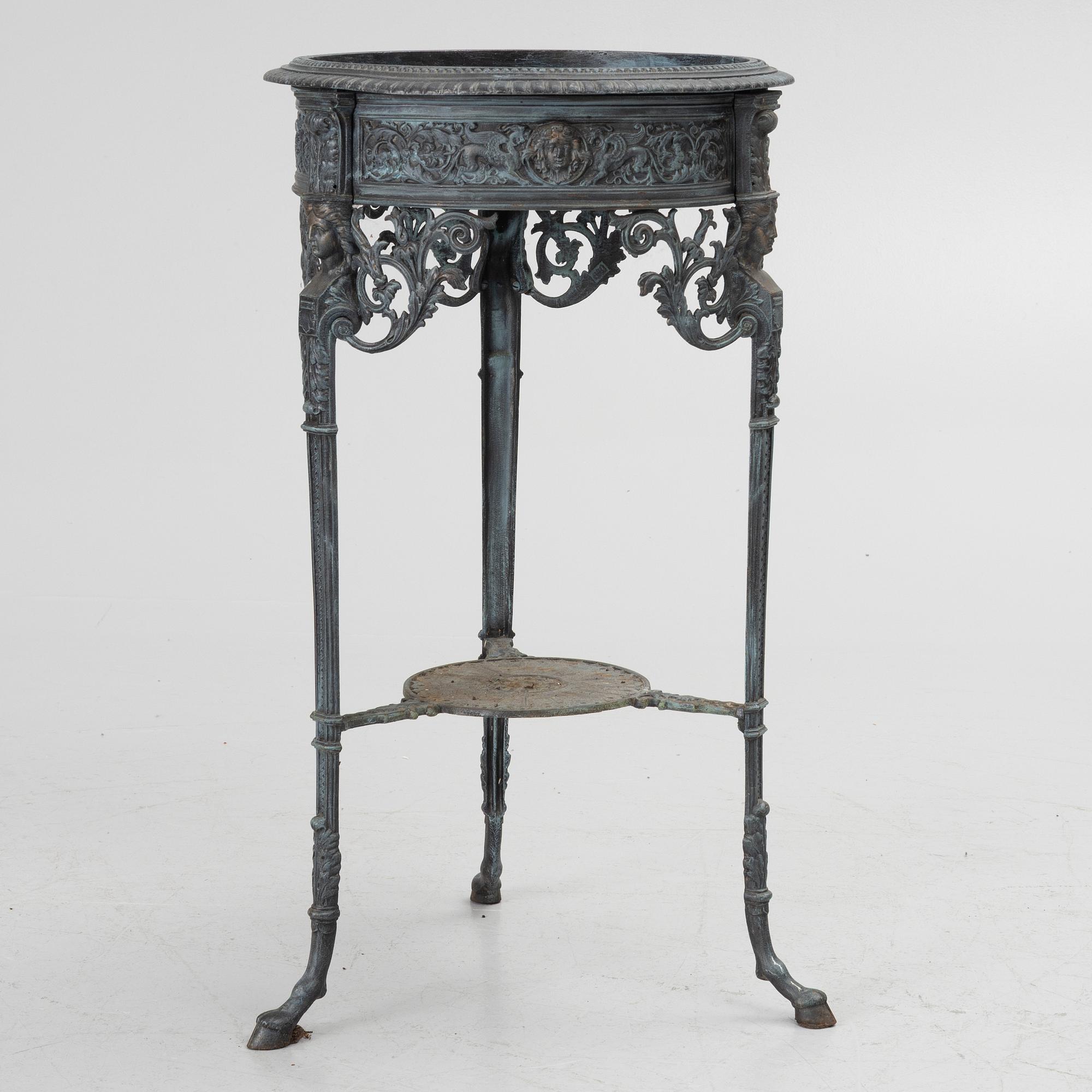 A plant stand, late 20th century.