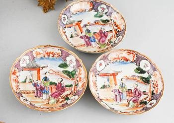 Three polychrome cups with barrels, three cups, one bowl with lid and one plate, Qing dynasty, 18/19th century.