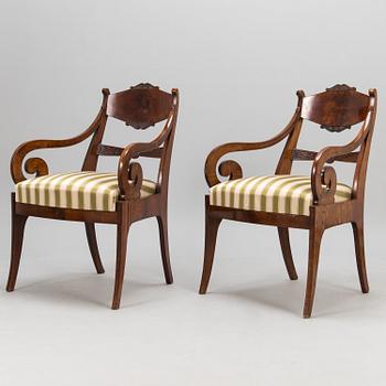 A pair of 1820-40's Russian open armchairs.