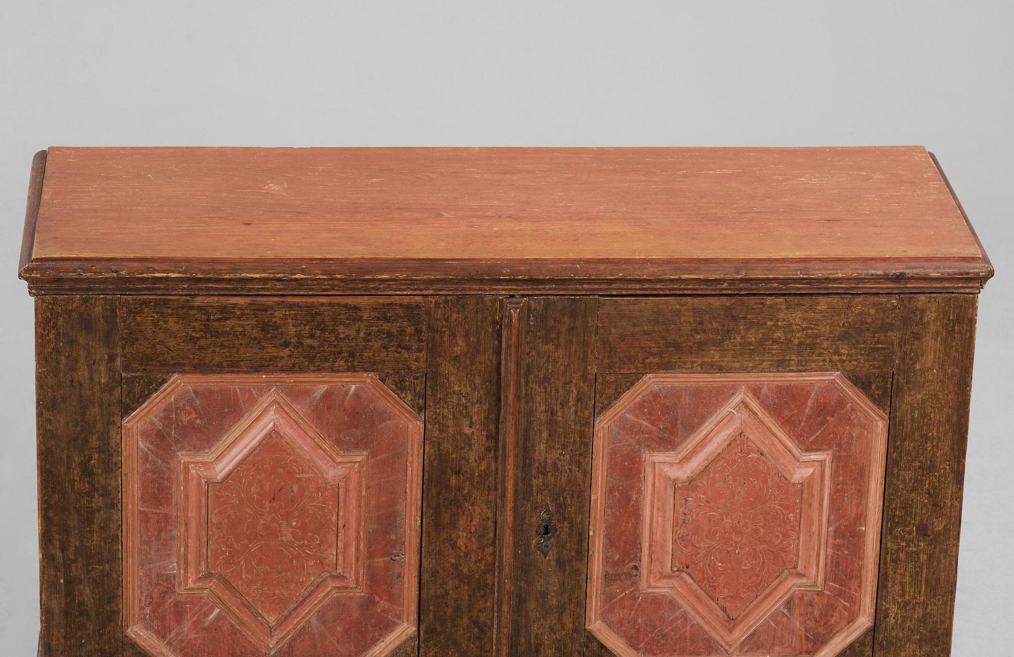 A Swedish polychrome-painted baroque cupboard, late 17th century / circa 1700.