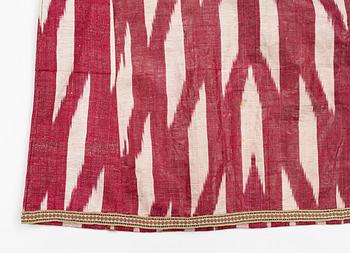 A silk and cotton Chapan, Ikat silk and cotton, Centralasien, 1880s.