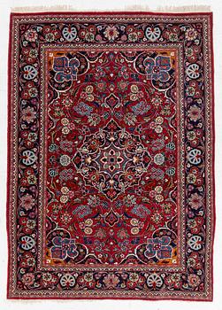 An oriental carpet, approx. 170 x 100 cm.