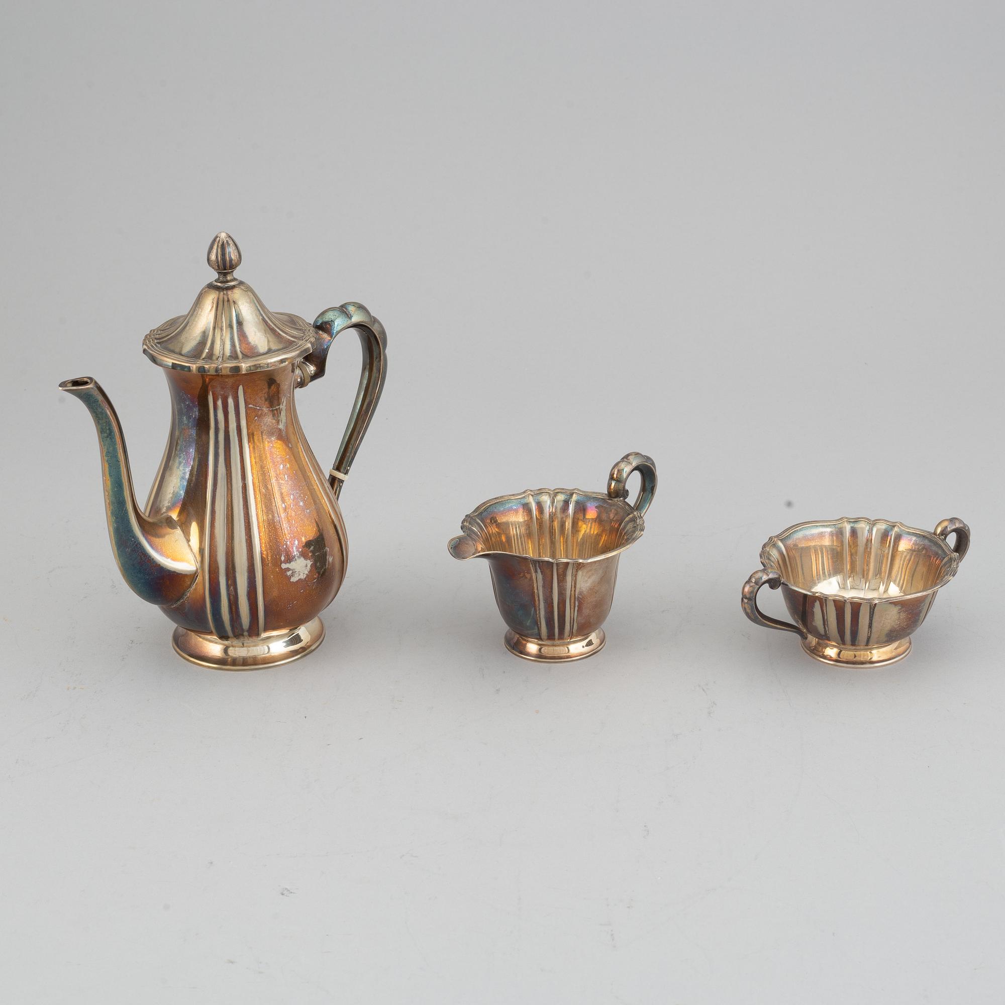 A silver coffee set and a tray, maker's mark Carl Hoff, Helsingborg, Sweden 1934 and 1933,