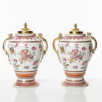 A pair of famille rose jars with gilded silver covers, Qing dynasty, Qianlong (1736-95).