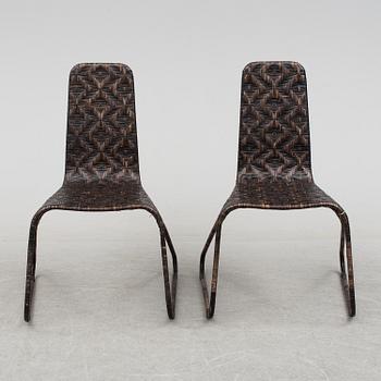 A pair of 'Flo-chairs' by Patricia Urquiola for Driade.