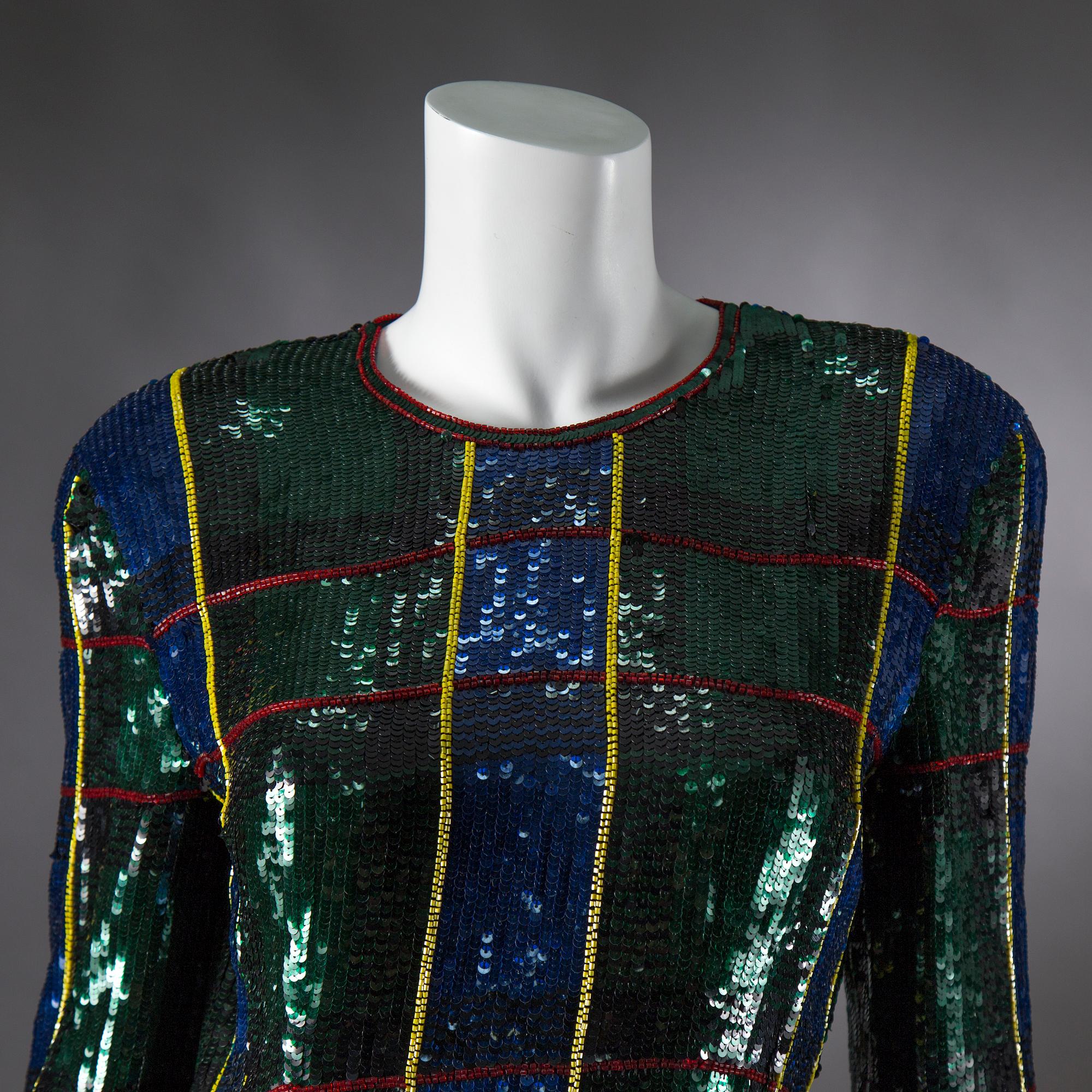 An Escada Couture sequin dress, size 38.