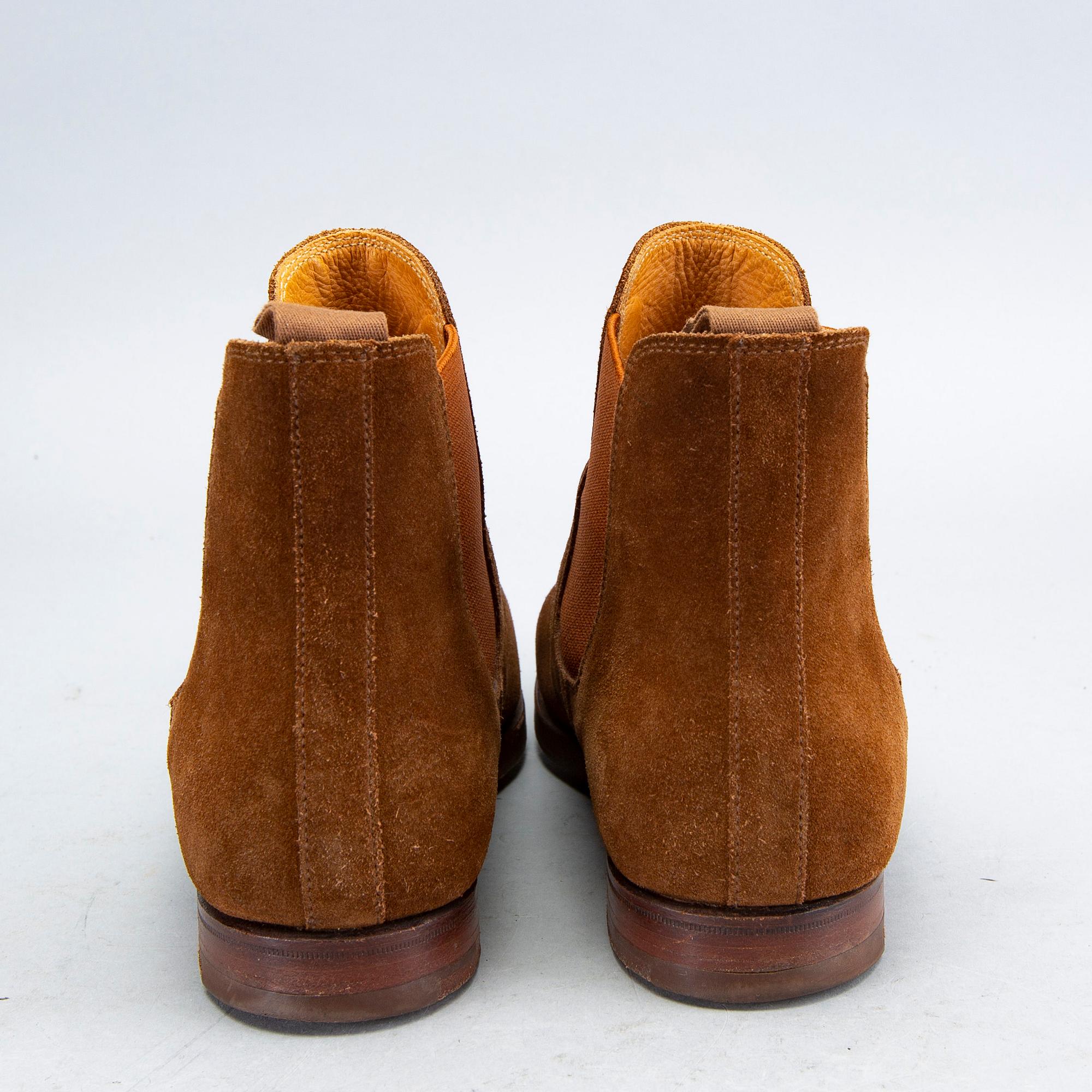 A pair of brown suede 'Gresham' Crockett & Jones boots.