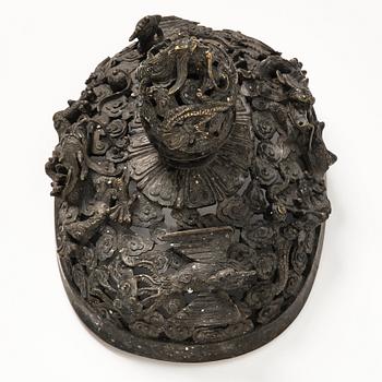 A bronze reticulated incense burner with cover, Qing dynasty (1644-1912).