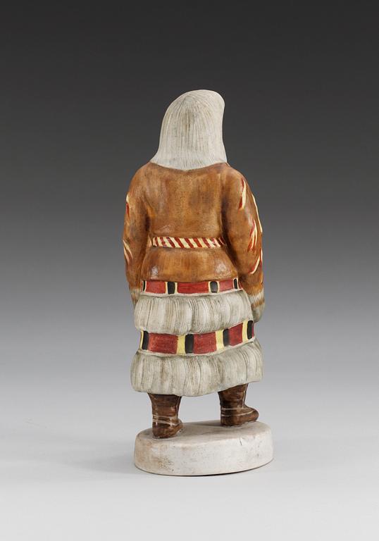 A Russian bisquit figure of a Samoyed woman from Mezen, Central Porcelain Trust, Dimitrovski, Verbilki, Moscow, 20th Century.