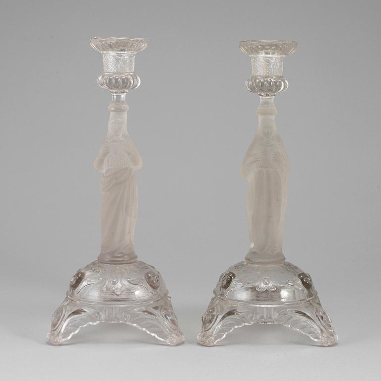 A pair of moulded glass candlesticks, late 19th century.