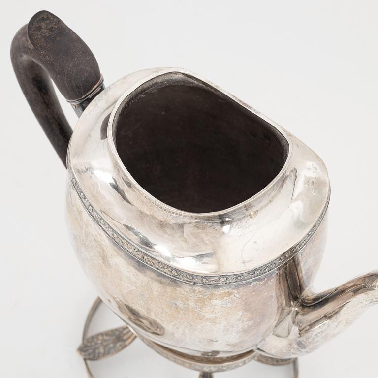 An Empire silver coffee pot with rechaud, first half of the 19th century.