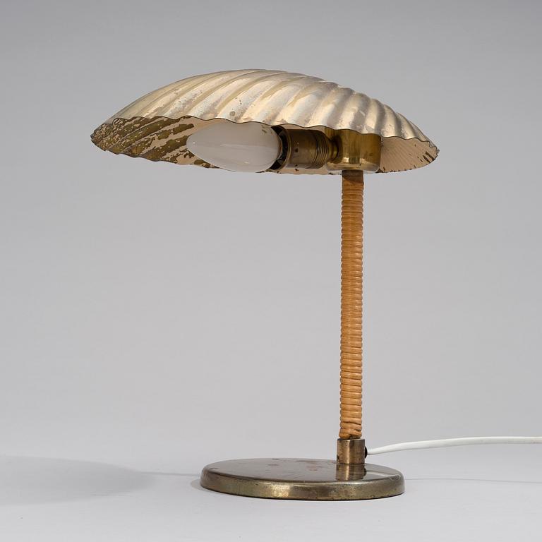 PAAVO TYNELL, A DESK LAMP. Shell. Manufactured by Taito Oy. Designed in 1938/-39.