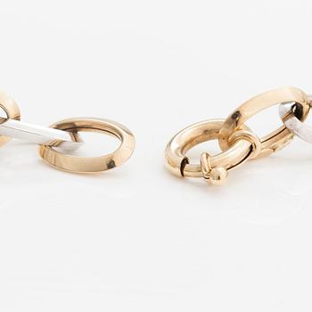 A 14K white and yellow gold necklace.