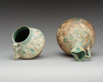 EWER and JUG. Height 23,5 and 13,5 cm. Iran 12th-13th century. The ewer from the Seljuk period, the jug from Kashan.