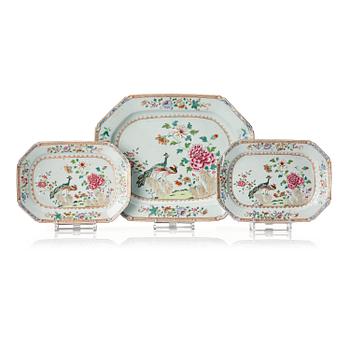 A set of three famille rose 'double peacock' serving dishes, Qing dynasty, Qianlong (1736-95).