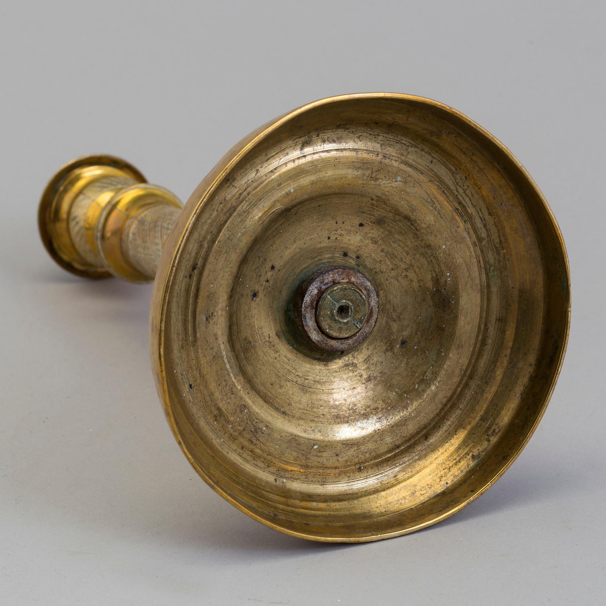 AN EMPIRE ORMOLU CANDLESTICK, first half of the 19th century.