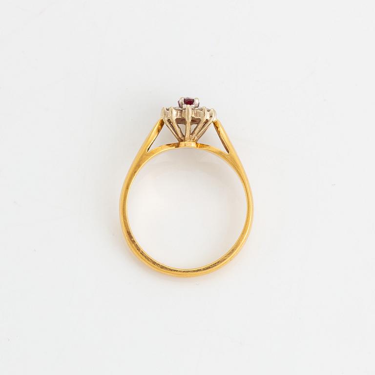 Navette cut ruby and brilliant cut diamond ring.