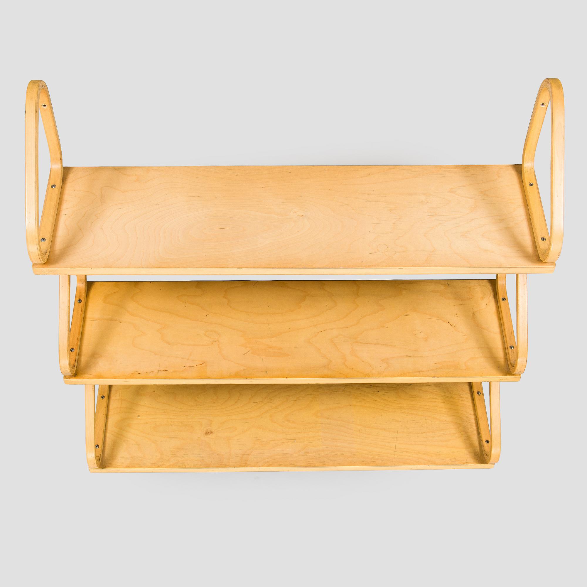 Alvar Aalto, three '112B' shelves, Artek, late 20th century.