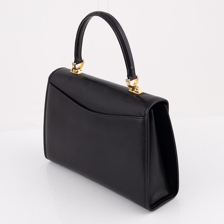 Bally, a black leather bag.