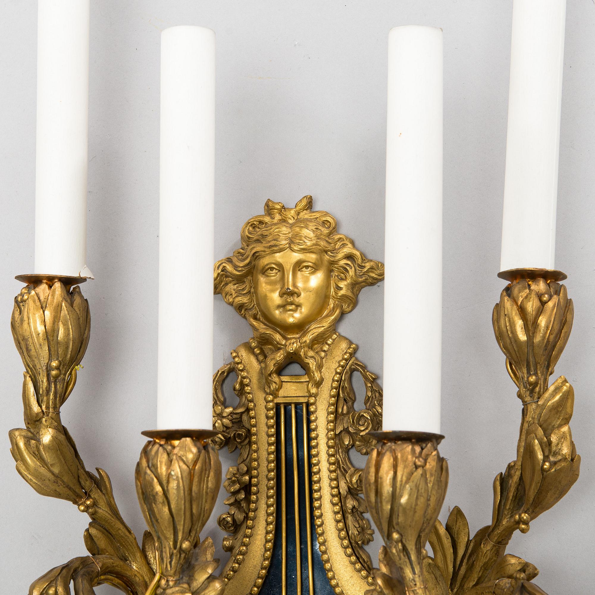 Vägglampetter, ett par, omkring 1900.