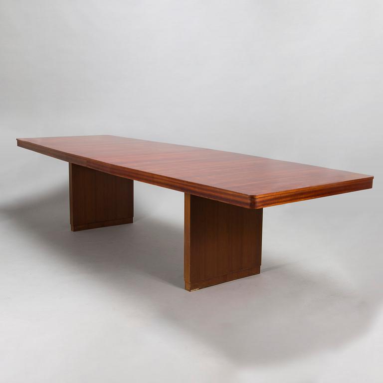 A mid 20th century conference table / dinner table marked Paul Boman.