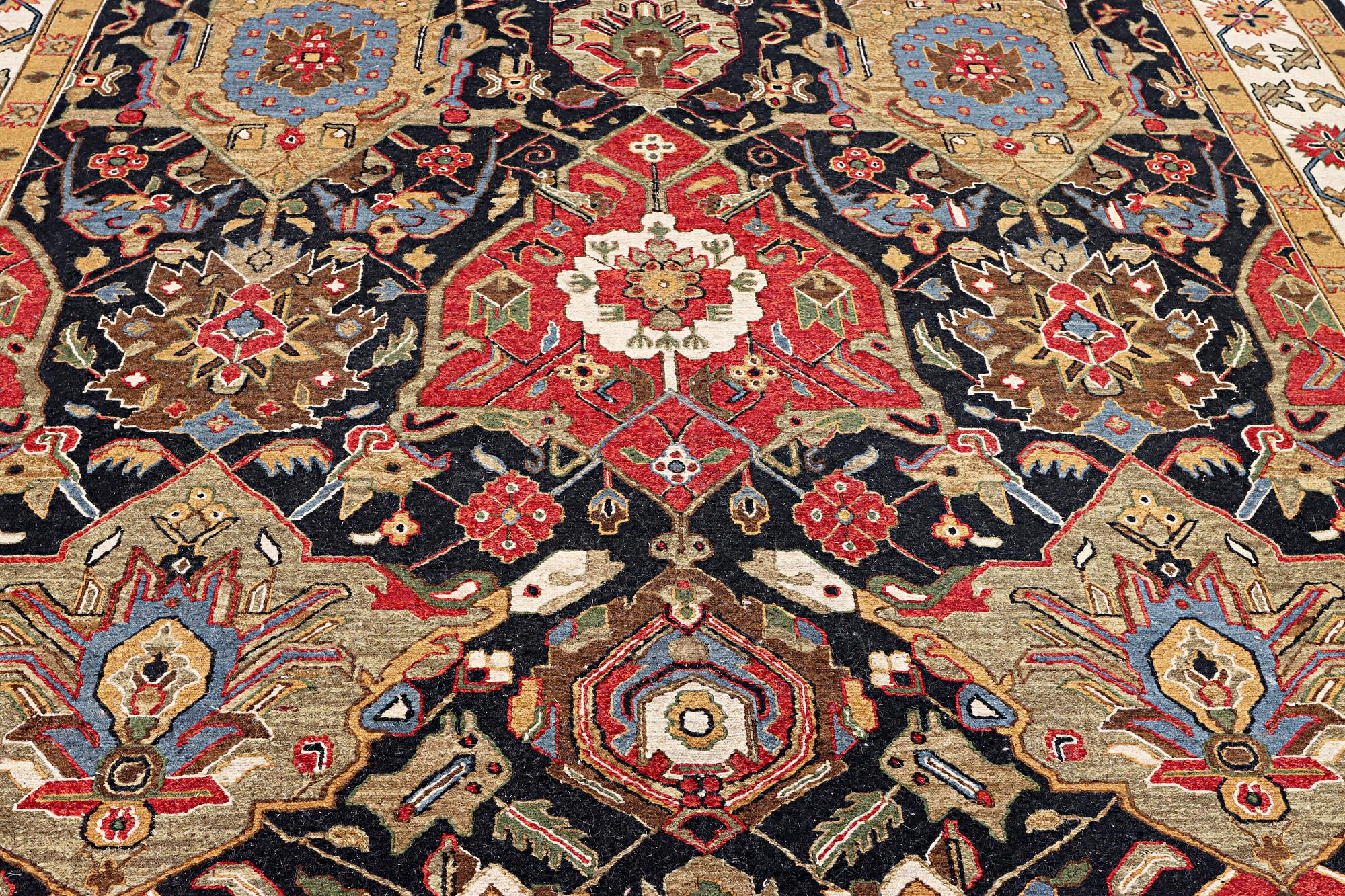 An oriental carpet with Mamluk design, c. 364 x 276 cm.