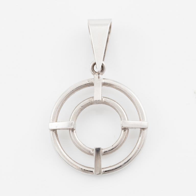 Brooch/pendant, 18K white gold with sapphire and brilliant-cut diamonds.