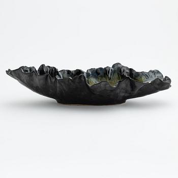 Pol Chambost, a glazed ceramic leaf shaped bowl or dish, signed.