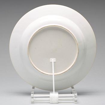 A set of eight blue and white armorial soup dishes, Qing dynasty, 18th Century.