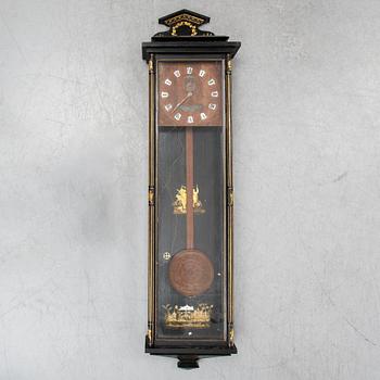 A lacquerwork wall pendulum clock, late 19th Century.