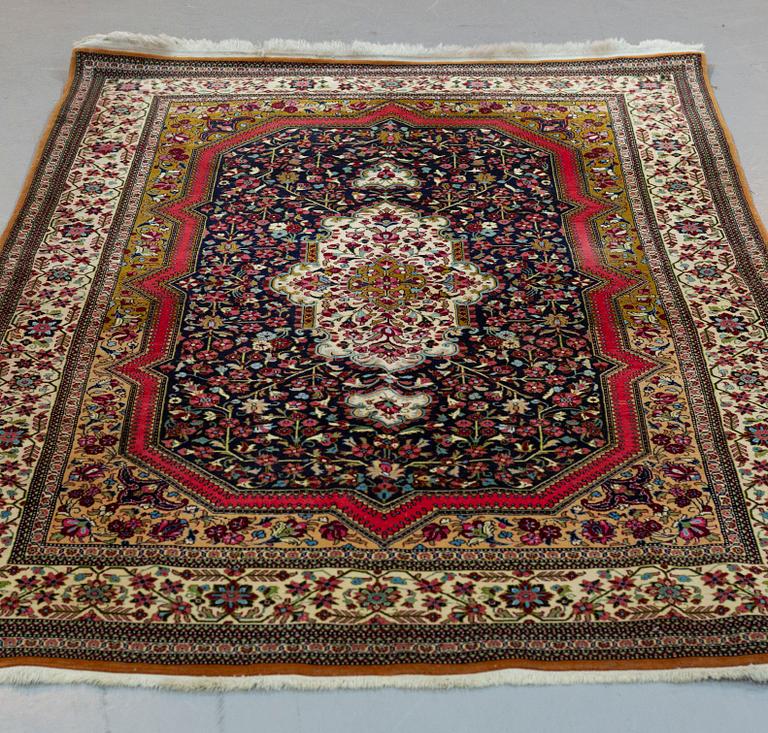 A RUG, Old Qum, ca 216 x 140 cm.