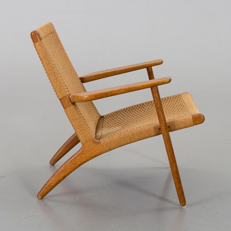 A HANS J WEGNER "CH 25" ARMCHAIR by Carl Hansen & Söner.