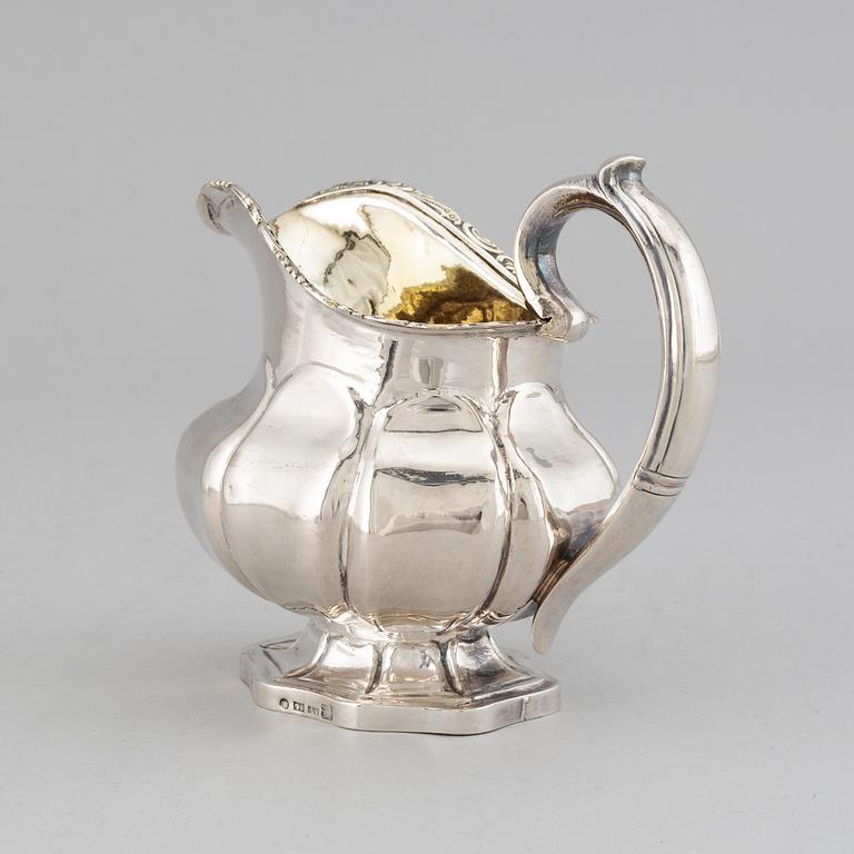 A Russian 19th century parcel-gilt silver cream-jug, mark of Abraham Forstedt, St. Petersburg 1840.