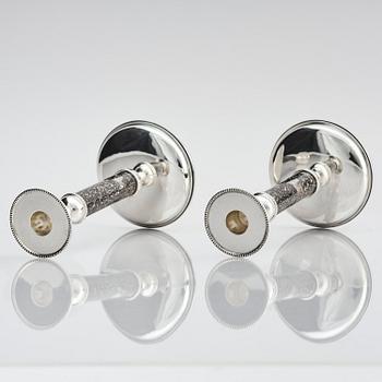 Henrik Ingemansson, a pair of sterling silver and Älvdal porphyry candelsticks, Ingemansson's Smithy, Stockholm, 2002.