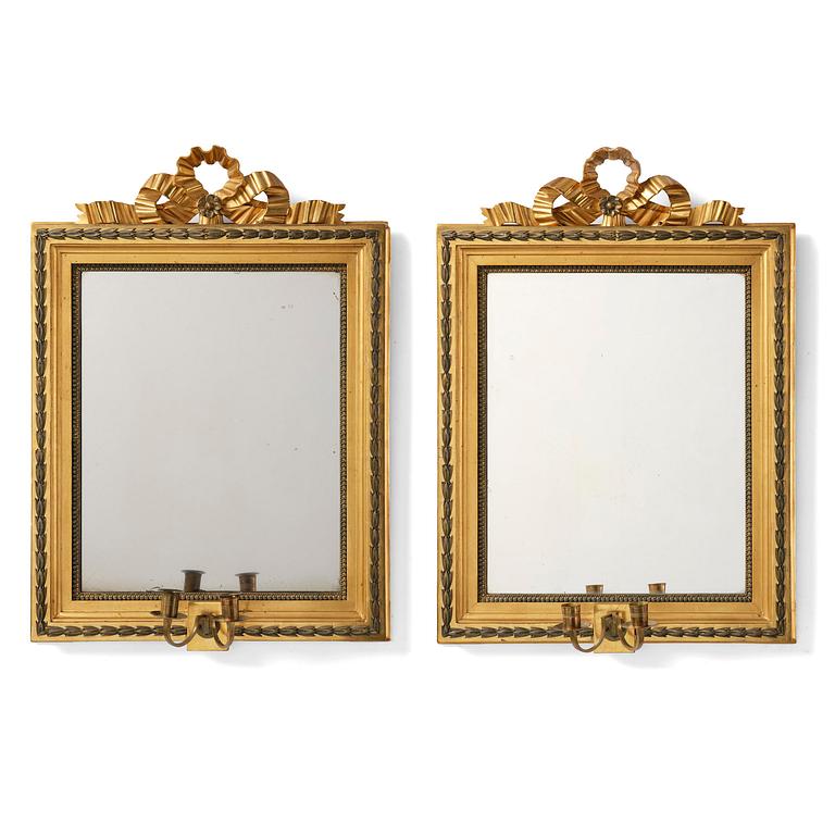 A pair of two-branch giltwood girandole mirrors attributed to P. Ljung (1743-1819).