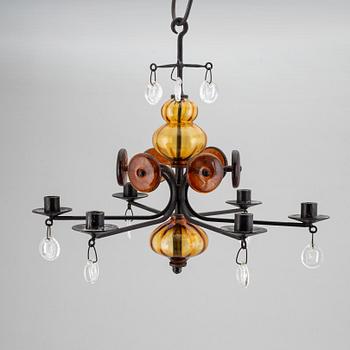 ERIK HÖGLUND, a cast iron and glass chandelier, Boda Smide.