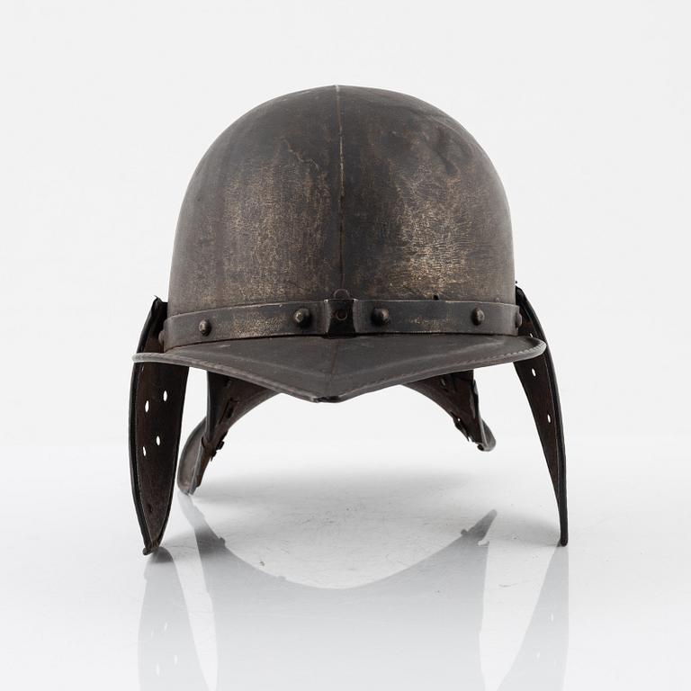 A 20th Century copy of a Lobstertail helmet.