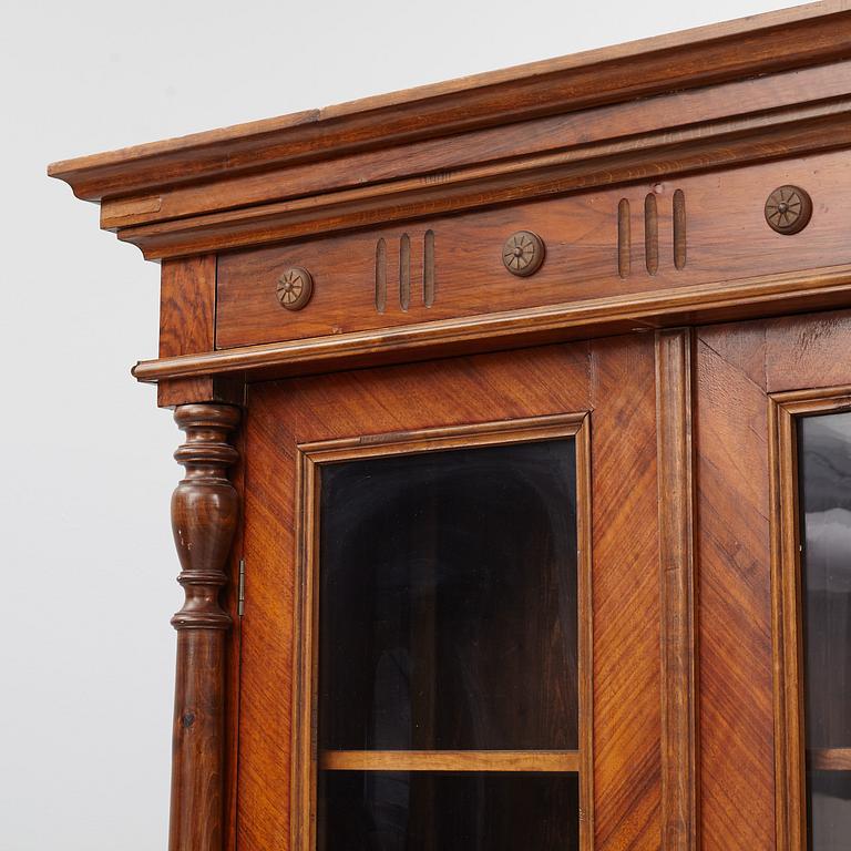 A display cabinet, late 19th century.