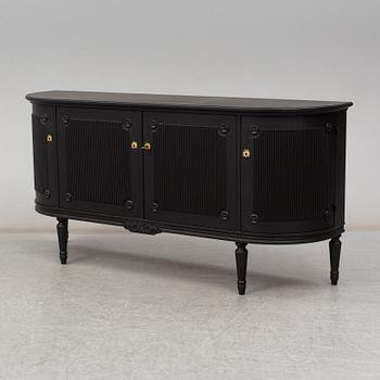 a gustavian style sideboard from the second half of the 20th century.