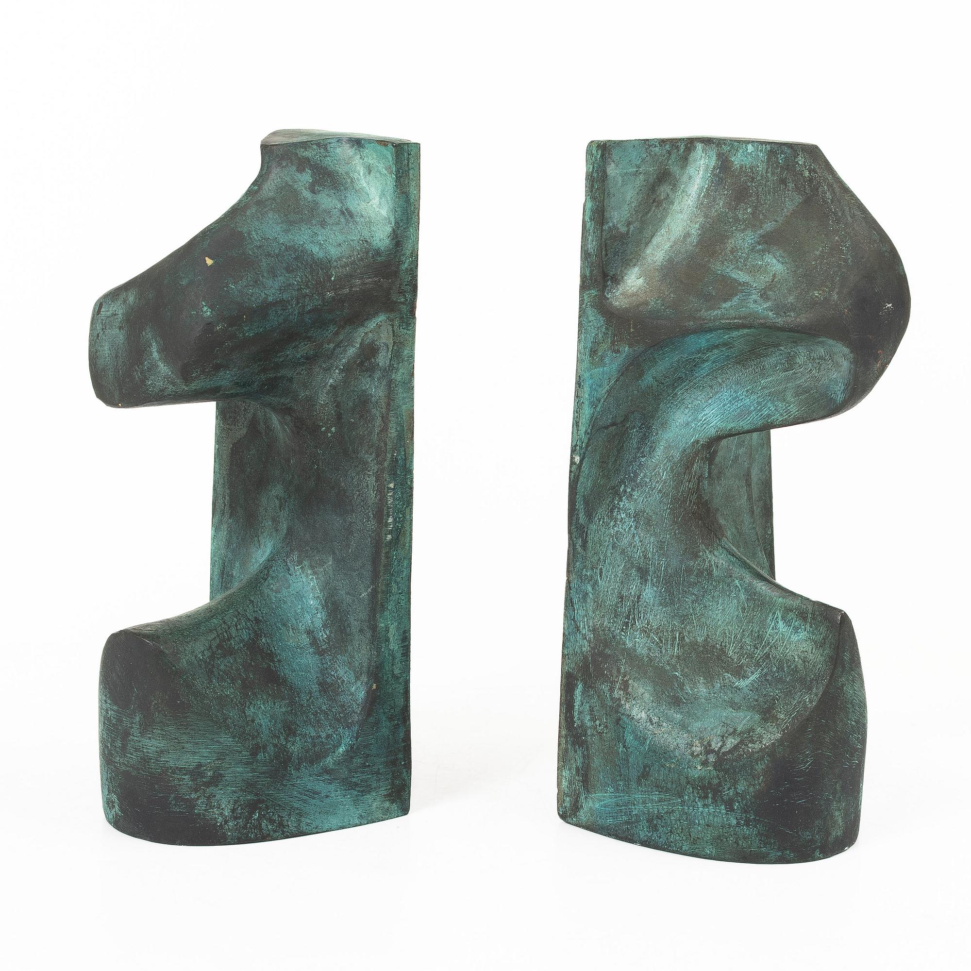 Björn Selder, a pair of green-patinated bronze sculptures/bookends, signed and numbered 4/100.