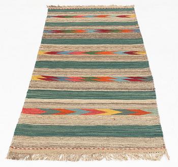 A Kilim runner, c. 213 x 74 cm.