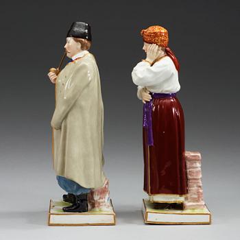 Two Russian figures of peasants, Popov, 19th Century.