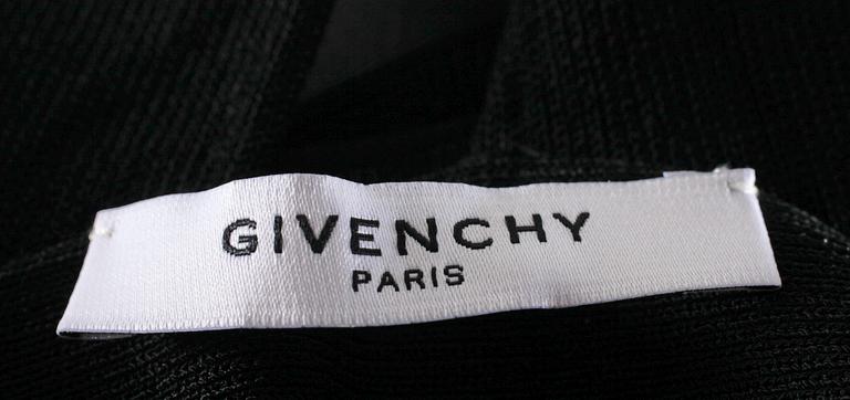 A black tight strech dress by Givenchy.