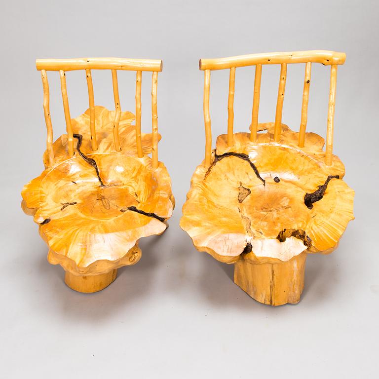 A pair of mid-20th century burr wood easy chairs made by  Johannes Järvelä, Finland.