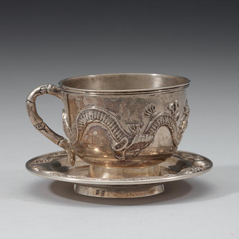 An export silver cup and saucer, probably Shanghai, early 20th century.