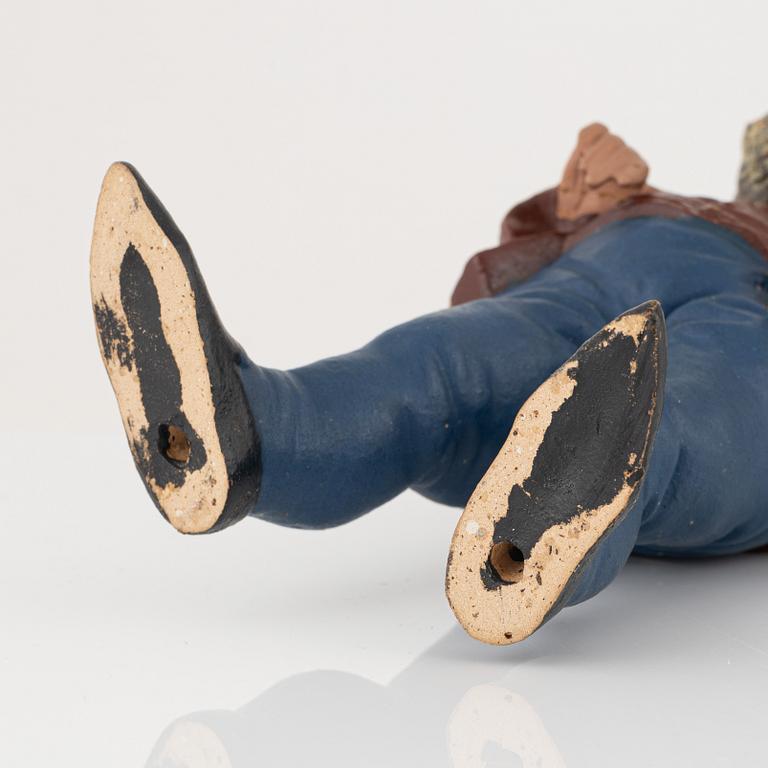 A pair of garden gnomes, mid-20th century.