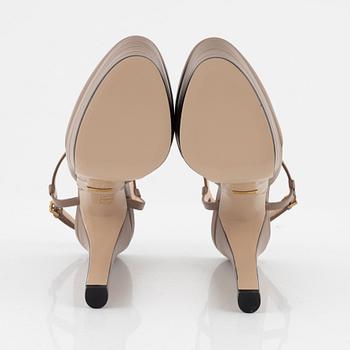 Gucci, a pair of nude leather high heel shoes, 2016, size 37.